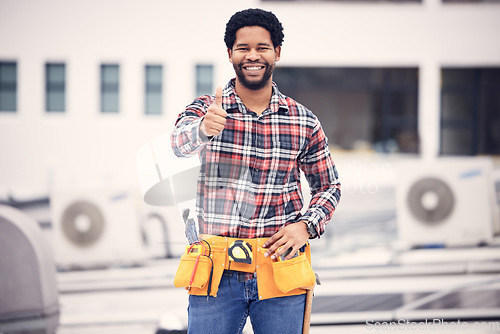 Image of Construction worker, portrait and man with thumbs up on a building roof for architecture success. Smile, happiness and industrial designer with vision and motivation for eco friendly power project