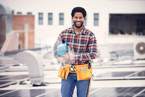 Image of Construction worker, portrait and man builder on a building roof for architecture and property management. Smile, happiness and industrial designer with vision and safety helmet with motivation