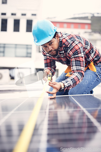 Image of Engineer man, measuring tape or roof solar panel in sustainable planning, clean energy or development. African technician, photovoltaic or installation system for power, sustainability or electricity