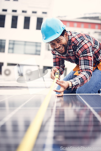 Image of Engineer man, measuring tape or solar panel on rooftop for sustainable planning, renewable energy or development. African technician smile, photovoltaic system or roof installation with measurement