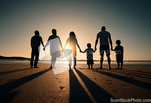 Image of Family silhouette at beach, generations holding hands at sunset and people with love, care and support outdoor. Travel, adventure and freedom, grandparents and parents with kids back and ocean view