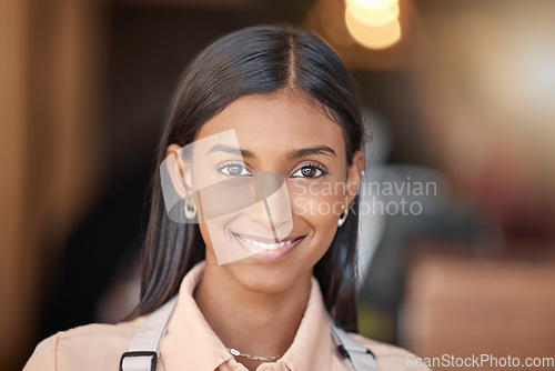 Image of Happy, smile and portrait of an Indian employee at work for corporate happiness and business. Young girl, headshot and a worker smiling with confidence in professional career, work and management