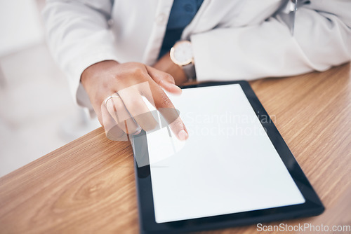 Image of Mockup, typing and hand of doctor on a tablet for healthcare, email and online services. Research, medical and a pharmacist or medic worker scrolling on mock up space screen on tech for communication