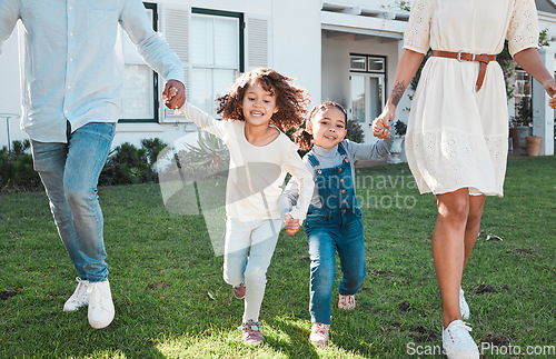 Image of Family, holding hands and kids running with their parents outdoor in the garden of their home together. Children, fun and daughter siblings playing with their mother and father outside in the yard