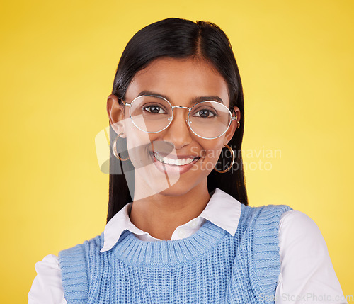 Image of Happy, glasses and portrait of woman in studio for business, corporate and professional. Smile, pride and happiness with face of female on yellow background for mindset, confident and mockup