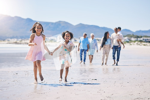 Image of Children running, family bonding and happy at the beach for travel, morning walking and holiday. Smile, summer and girl siblings holding hands on a walk at the ocean with parents and grandparents