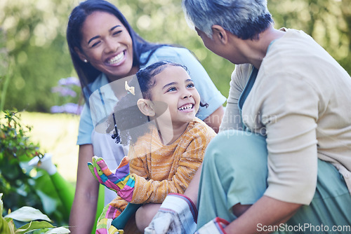 Image of A mother, grandmother and daughter gardening together outdoor for growth or sustainability during spring. Plants, kids and earth day with a family bonding in the garden for eco friendly landscaping