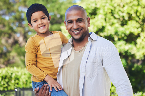 Image of Portrait, son and father with a smile, outdoor and bonding with happiness, family and cheerful. Face, parent and dad with boy, love or embrace in nature, outside and affection with joy, park or relax