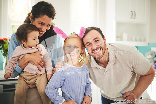 Image of Parents, girl children and bunny ears in portrait in family home with love, baby or happiness for easter. Man, woman and kids in house, laughing and excited for holiday with love, care and bonding