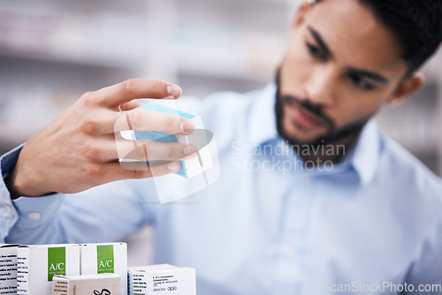 Image of Pharmacy stock, man and hand in drugs check of a customer in a healthcare and wellness store. Medical, retail inventory and pharmaceutical label information checking of a male person by a shop shelf