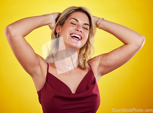 Image of Fashion, funny comedy and woman laughing, happy and smile for style, humor or comic joke. Beauty, luxury apparel clothes and stylish female model with cosmetic makeup isolated on yellow background