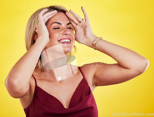 Image of Fashion, beauty and woman laughing, happy and smile for cosmetics, trendy clothes or aesthetic makeup. Funny joke, luxury apparel and female model laugh at comedy isolated on yellow background