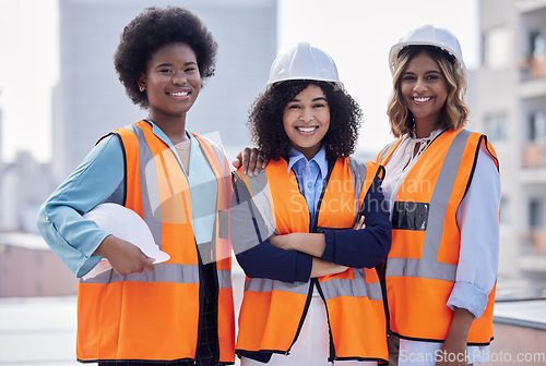 Image of Happy, arms crossed and portrait of architects on a site for construction work, building and engineering. Smile, teamwork and female builders in collaboration for an industrial project in the city