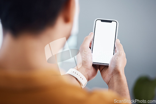 Image of Man, hands and phone with screen mockup for advertising, marketing or social media at the office. Hand of male employee holding mobile smartphone display for communication or app with copy space