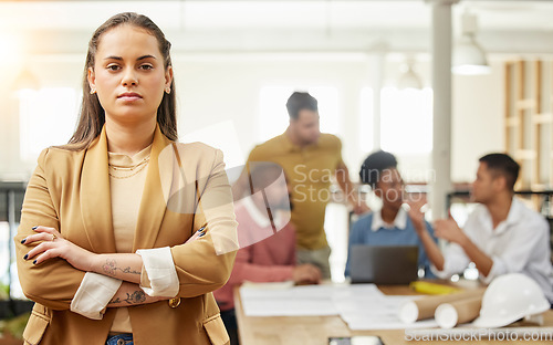 Image of Serious, business and arms crossed with portrait of woman in meeting for planning, leadership and project management. Creative, training and face of employee in office for teamwork and workshop