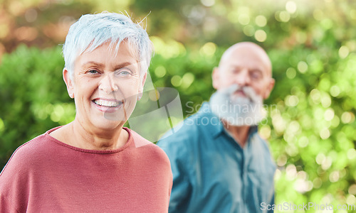 Image of Nature, happy and portrait of a senior woman on an outdoor walk with her husband for health and wellness. Happiness, smile and face of a elderly female person in retirement walking in garden or park.