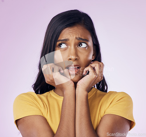 Image of Scared, thinking and face of Indian woman on pink background with fear, nervous and confused expression. Stress, anxiety mockup and isolated female with worried, anxious and crisis reaction in studio