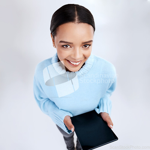 Image of Portrait of happy woman, tablet and top view in studio, isolated white background and mockup screen. Female model, digital technology and social media app for network, internet user or download ebook