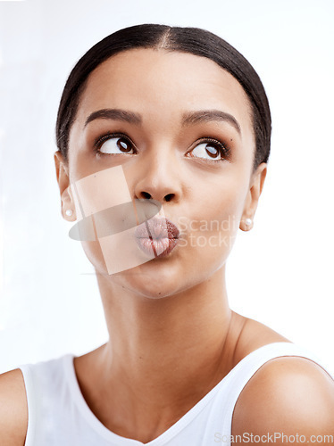Image of Thinking face, skincare and pout of woman in studio isolated on a white background. Natural cosmetics, beauty makeup and female model with glowing, healthy or flawless skin after facial treatment.