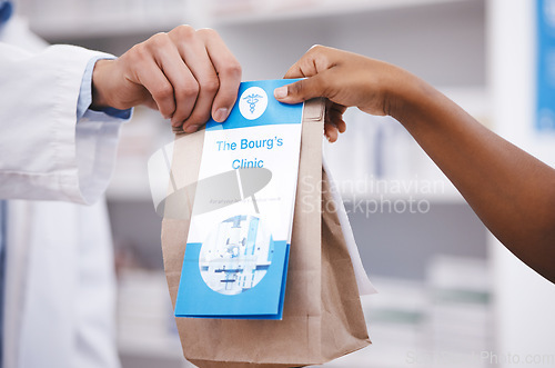 Image of Clinic, medicine or pharmacist hands person a bag in drugstore with healthcare prescription receipt. Zoom, shopping or doctor giving customer products or pharmacy package for medical retail services