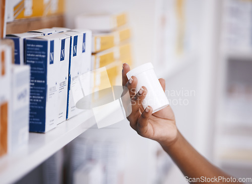 Image of Shopping, medicine or hand of person with pills or supplements in drugstore for healthcare help. Zoom, pharmaceutical or customer checking or reading info on medical products or tablets in pharmacy