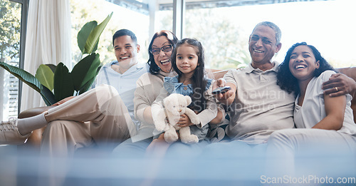 Image of Happy family watching tv with parents, grandparents and child on sofa in living room, happiness and quality time together. Kid with teddy bear, women and men on couch to watch comedy movie with smile