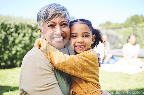 Image of Grandmother, girl and garden portrait with hug, love and bond in summer sunshine with family. Senior woman, female child and embrace with excited face, pride and care with happiness on backyard lawn