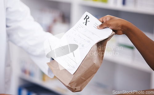 Image of Retail, medicine or pharmacist hands a person a bag in drugstore with healthcare prescription receipt. Zoom, shopping or doctor giving customer product, pills or package for medical pharmacy services