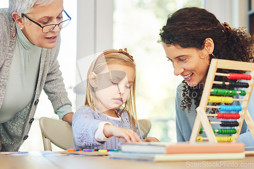 Image of Education with grandmother, mom and girl in home with abacus for lesson, homework and learning. Child development, family and mom, grandma and kid with educational toys for homeschool and teaching