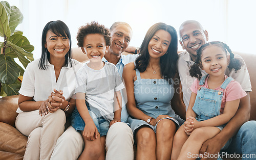 Image of Big family, portrait and happiness in home living room on sofa, bonding or having fun. Smile, parents and grandparents with children in lounge, care and enjoying quality time together on house couch.