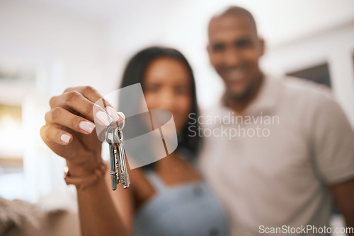 Image of Happy couple, hands and keys for real estate purchase, property or homeowner with mortgage loan or finance. Hand of woman and man realtor holding key to house, moving or sale for new home investment