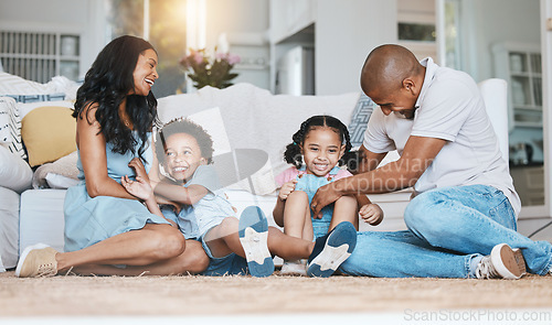 Image of Play, family and happy parents and children on floor for bonding, quality time and relaxing at home. Love, living room and mother, father and kids playing for relationship, development and happiness