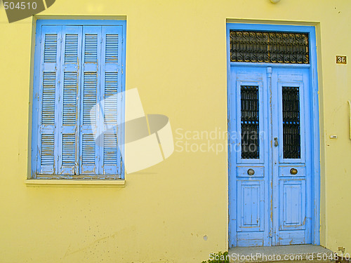Image of yellow and blue house