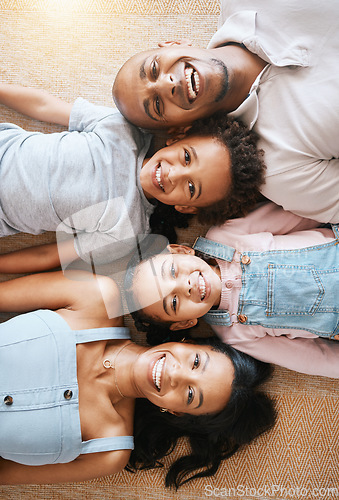 Image of Family, portrait and top view smile on carpet, bonding or having fun together. Parents, happiness above and children relaxing or lying on floor with man and woman, care or enjoying time in home.