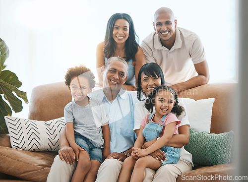 Image of Portrait, love and big family on a couch, smile and bonding with happiness, cheerful or joy at home. Face, grandparents or mother with father, siblings or children on a sofa, chilling or quality time