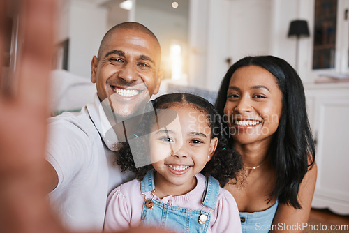 Image of Portrait, family and selfie smile in home living room, bonding and having fun. Photo, happiness and child with parents, care and taking face pictures for happy memory, social media or profile picture