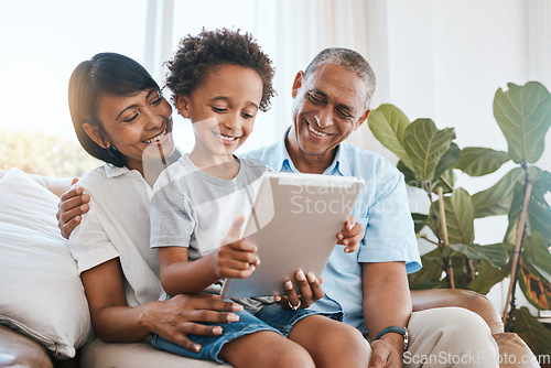 Image of Happy, streaming and a child with grandparents and a tablet for a movie, funny video or games. Smile, online film and a boy kid with a senior man and woman and technology for internet, game and media