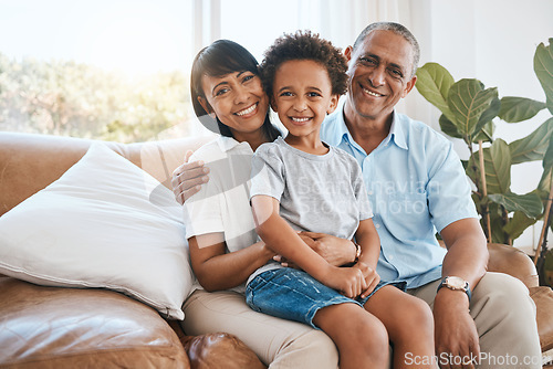 Image of Portrait, grandparents and kid smile in home living room on sofa, bonding or having fun. Family, happiness or child with grandma and grandpa, care or enjoying quality time together on couch in lounge