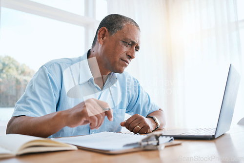 Image of Businessman, laptop and remote work thinking with documents in finance, budget or planning at home office. Thoughtful man freelancer working on computer with financial paperwork for schedule plan