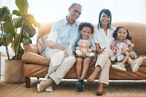 Image of Grandparents, portrait and kids smile in home living room on sofa, bonding or having fun. Family, happiness and children with grandma and grandpa, care and enjoying time together with teddy bear.