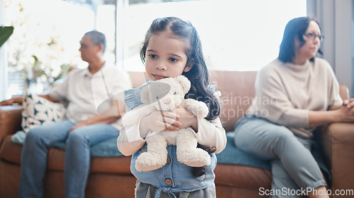 Image of Divorce, mother and father with a sad girl, teddy bear and separation at home, living room and ignore. Parents, mama and dad with daughter, female child with a toy and family with issues and problems