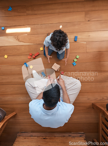 Image of Building blocks, toys and top view of father with baby on floor for playing, educational games and learning. Child development, family home and above of dad and boy for creative fun, bonding and love