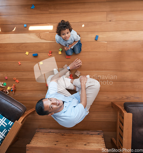 Image of Portrait, toys and top view of father with kid on floor for playing, educational games and learning. Child development, family home and above of happy dad and young boy for fun, bonding and love