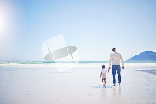 Image of Father, boy and beach with mockup space, holding hands and blue sky with bonding with vacation in summer. Papa, male kid and solidarity with trust, holiday and ocean mock up with waves in sunshine