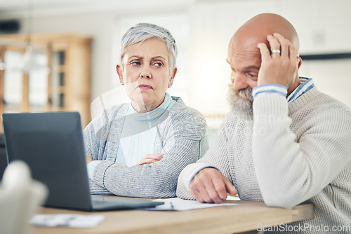 Image of Laptop, stress and budget with a senior couple feeling anxiety about their pension or retirement fund. Computer, debt finance or accounting with old people problem solving their savings or investment