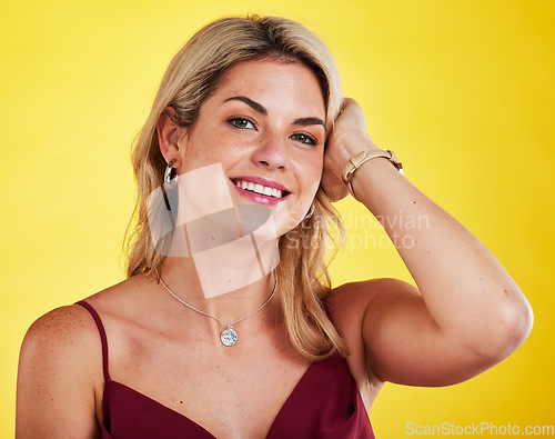 Image of Fashion portrait, studio or face of happy woman in facial cosmetics, pride or stylish aesthetic makeup. Beauty happiness, elegant and clothes for confident female model isolated on yellow background
