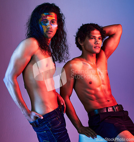 Image of Creative, body and men models in neon background for creativity with paint as artwork isolated on a purple studio backdrop. Colorful, muscle and artistic people for skin, beauty or fashion pose