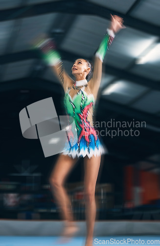 Image of Woman, gymnastics and motion blur in gym for performance, training and dancer with creativity in contest. Female gymnast, athlete and dance for workout, sports and wellness with balance, art or focus