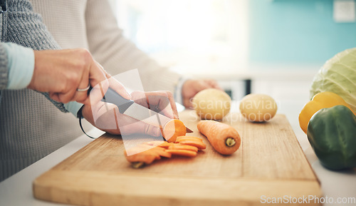 Image of Cutting board, closeup or couple hands cook vegetables in a kitchen for healthy, vitamins and nutrition diet in a home. Meal, chef and people preparing fresh produce or salad together for dinner