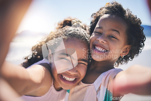 Image of Girl children, hug and selfie at beach with smile on face, sunshine or friends with fun, travel or summer on social media. Female kids, siblings or photography for profile picture, vacation or family